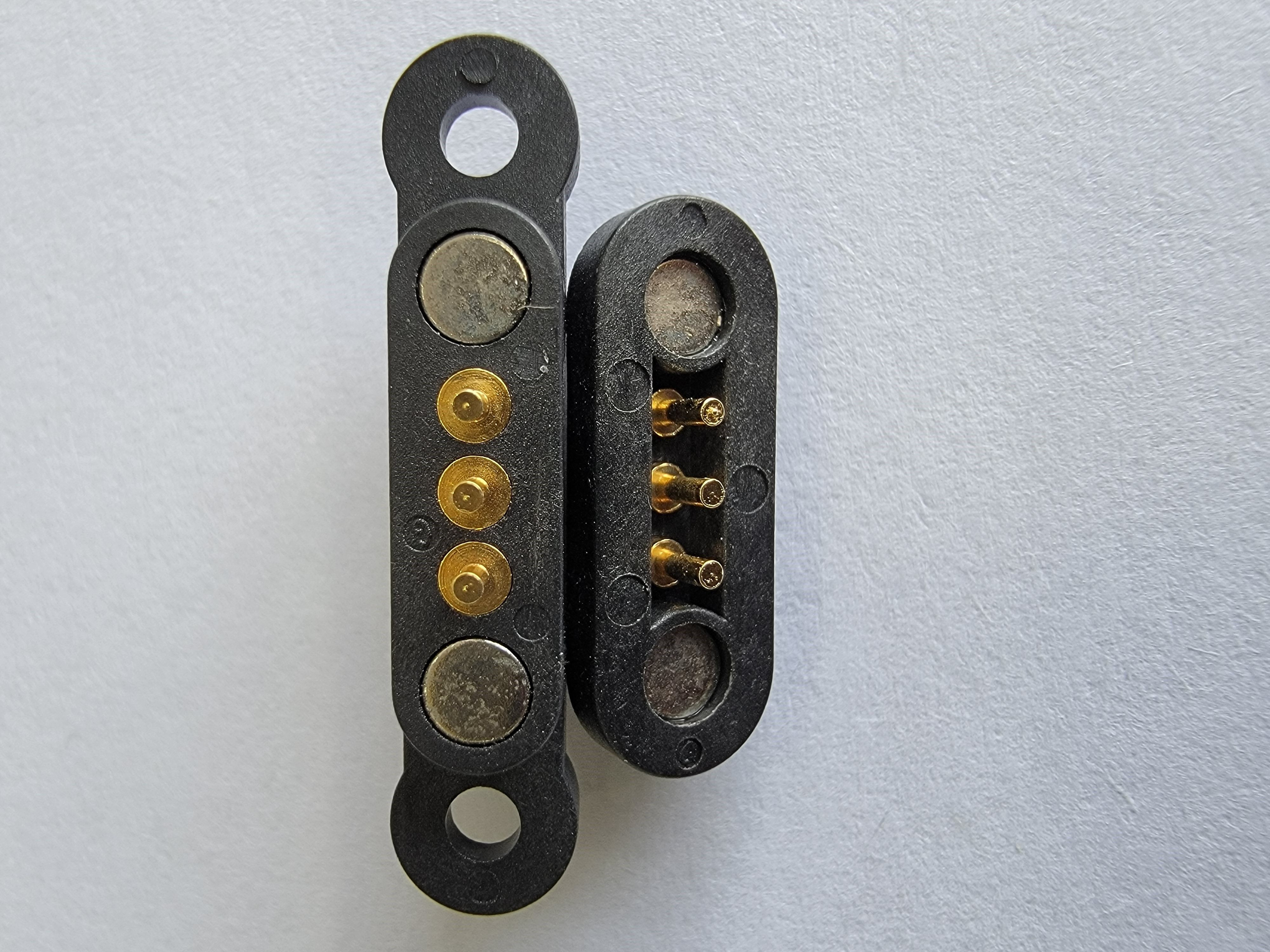 Magnetic Pogo pin is a formed by plastic box and brass pin a  basic components