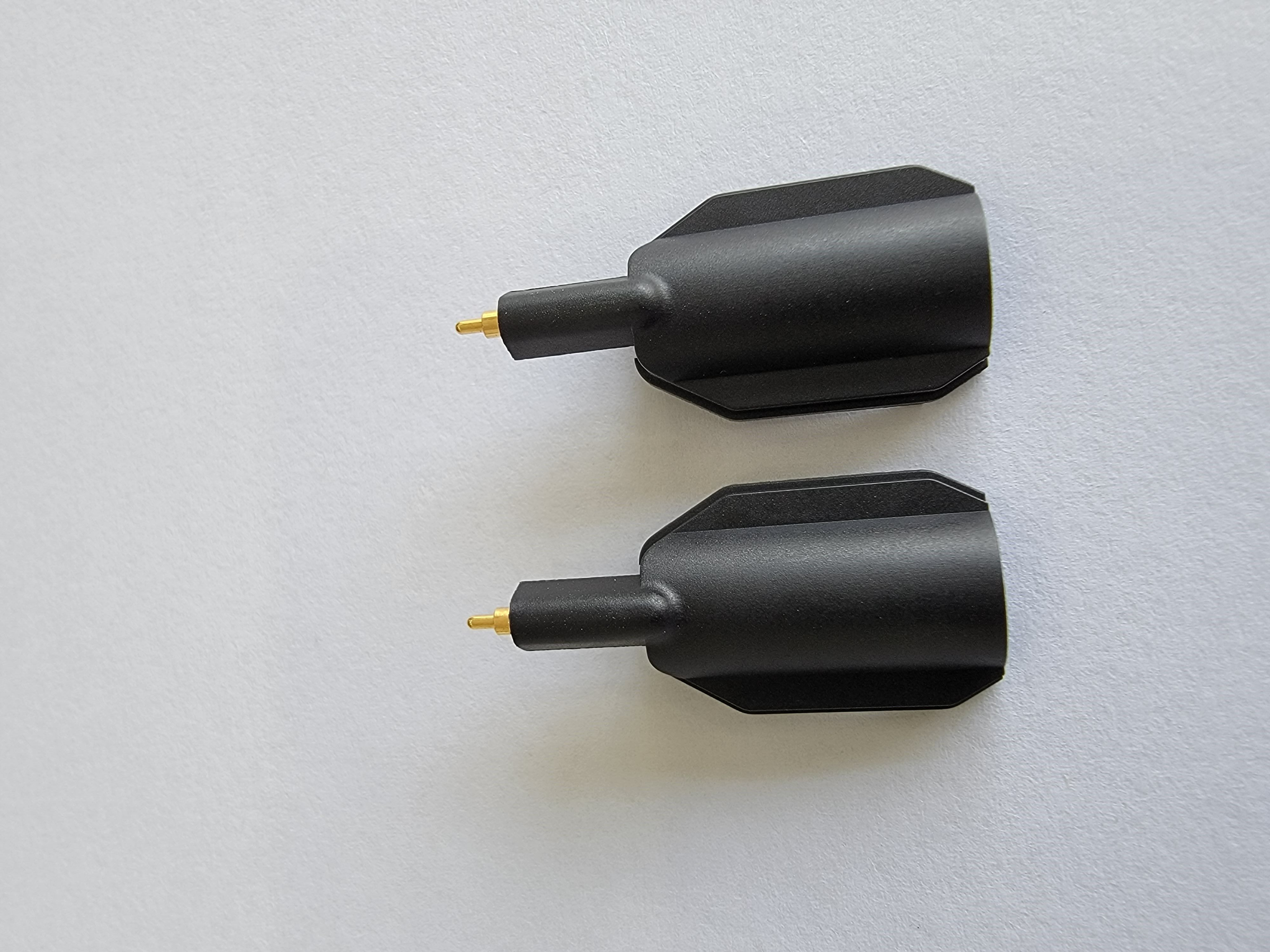 Test contact pins by plunger and tube
