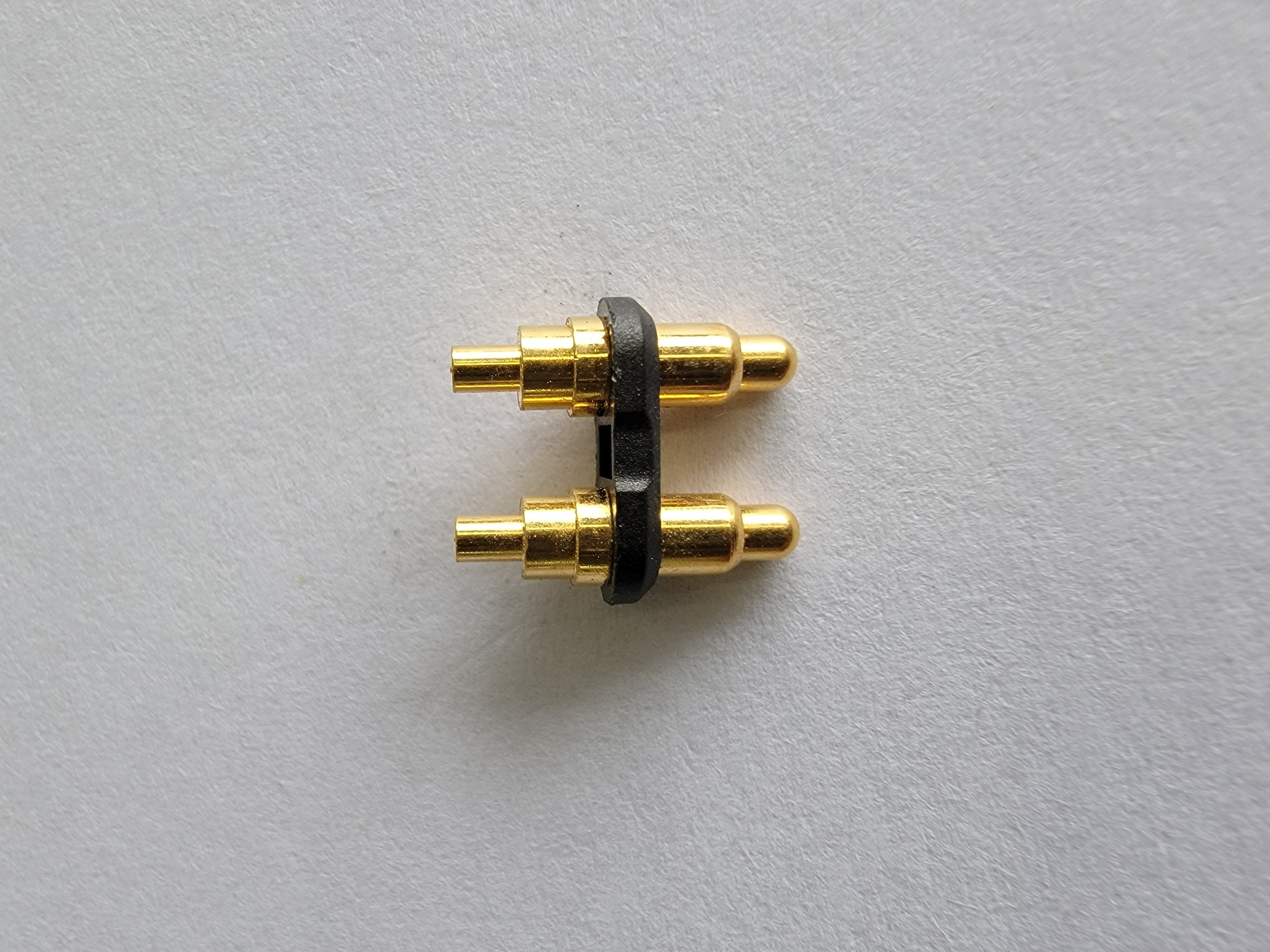 Brass crimp connectors by plunger and tube and a spring