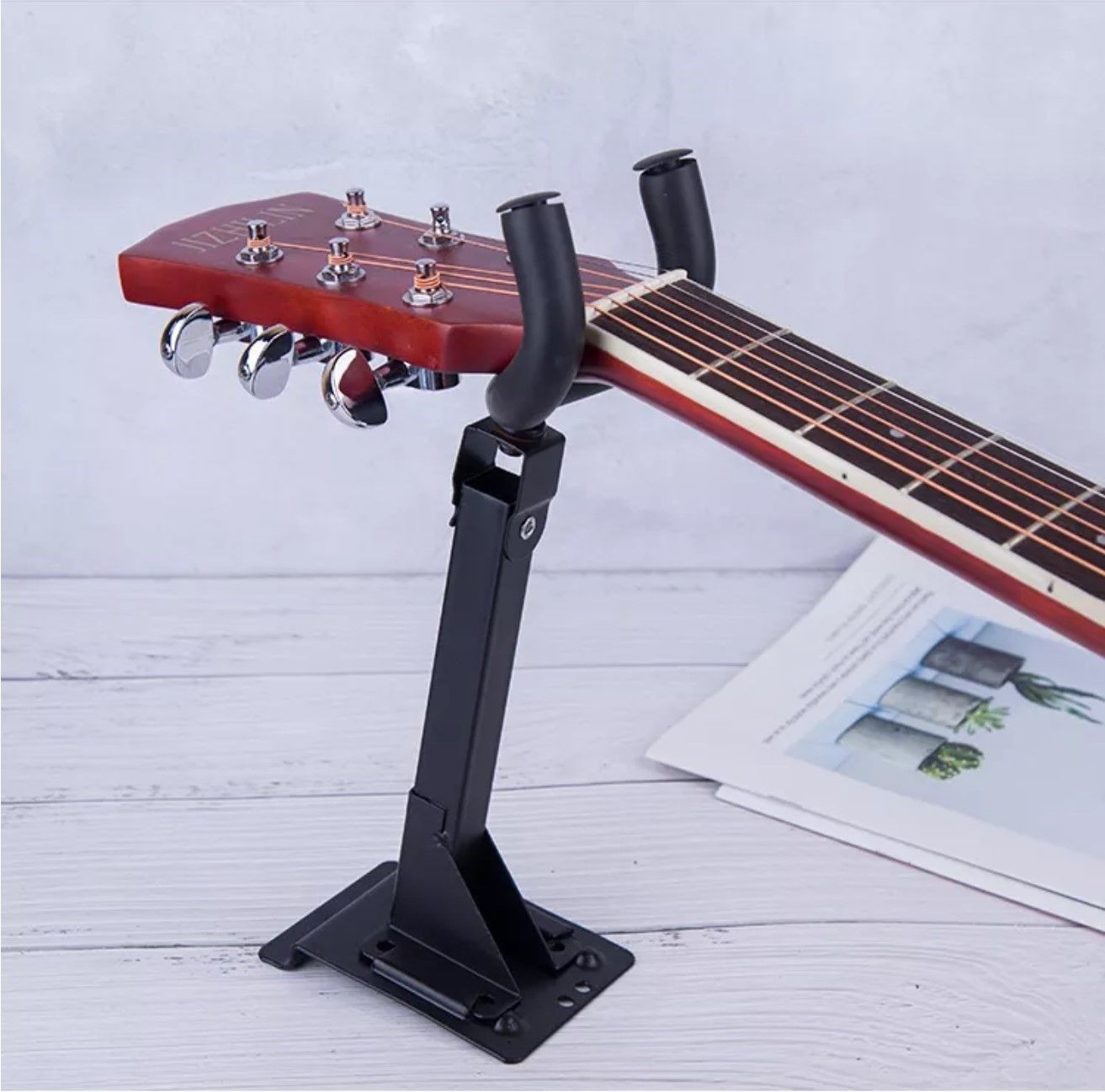 Guitar wall mount hangers suitable for a variety of string instruments